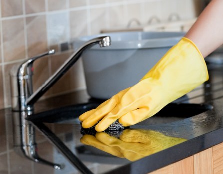 Professional after builders cleaning removing dust from a renovated interior